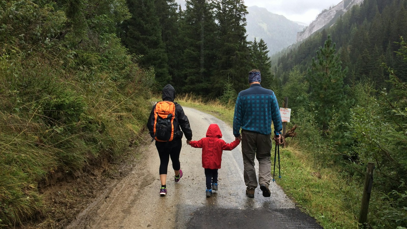 Family hiking together on a forest trail