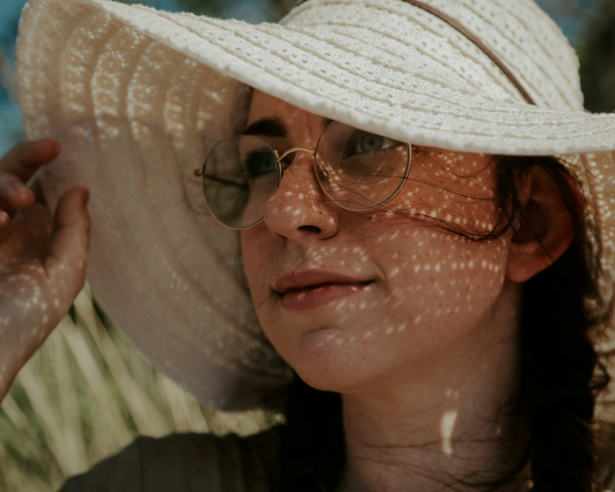 Family using hats and sun protection outdoors
